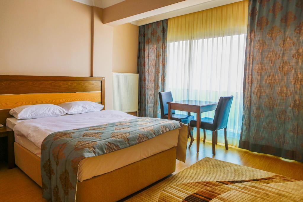 Perla Hotel Дикили Номер фото